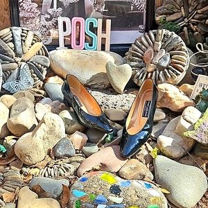 Stuart Weitzman patent leather flair heel pump